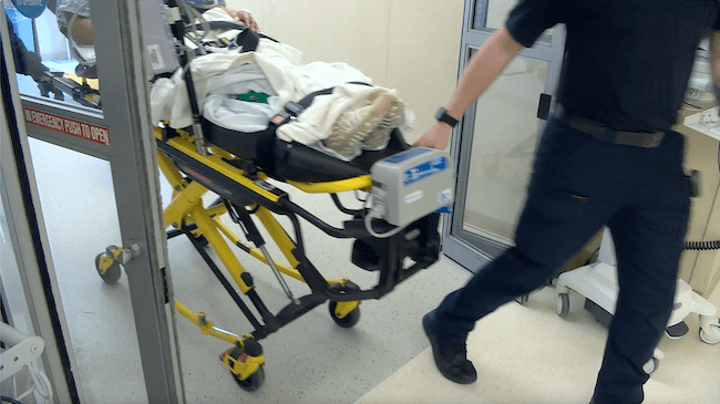 An anonymous patient is wheeled into the Emergency Department at Cleveland Medical Center.