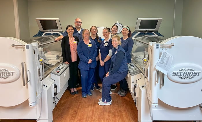 Lake West Wound Care team with hyperbaric oxygen therapy chambers