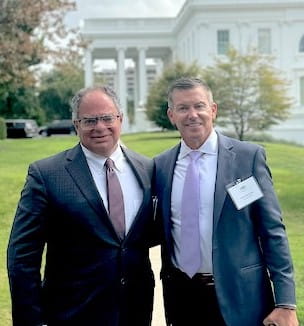 Drs. Cliff Megerian and Peter Pronovost on the White House lawn