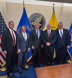 Dr. Cliff Megerian with three healthcare CEOs and HHS Secretary RFK, Jr.