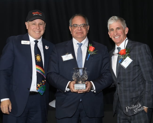 Photo of Dr. Megerian with Dr. Simon and the director of Kindland.