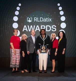 Thumbnail image of UH representatives with their award for Compliance.