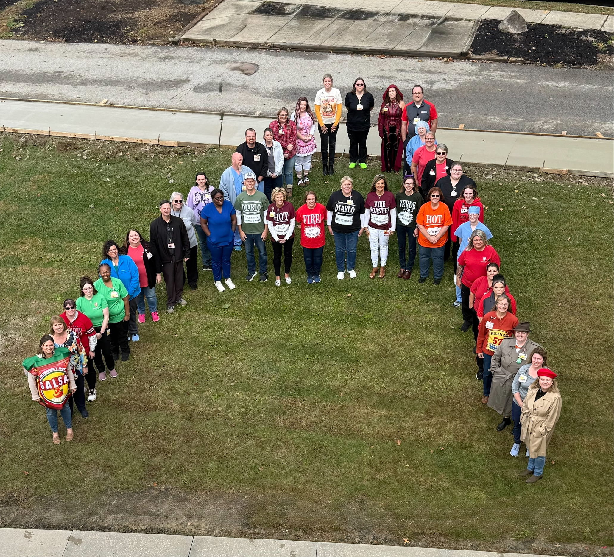 UH Samaritan caregivers form a letter A celebrating their Leapfrog honor